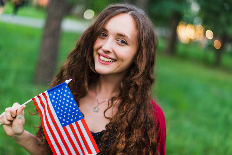 files/smiling-girl-with-american-flag-nature_23-2147824508.avif